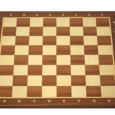 A wooden chessboard with light and dark squares