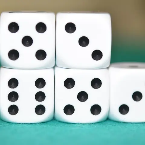 White dice with black dots