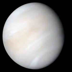 Pale yellow-white planet Venus covered in clouds